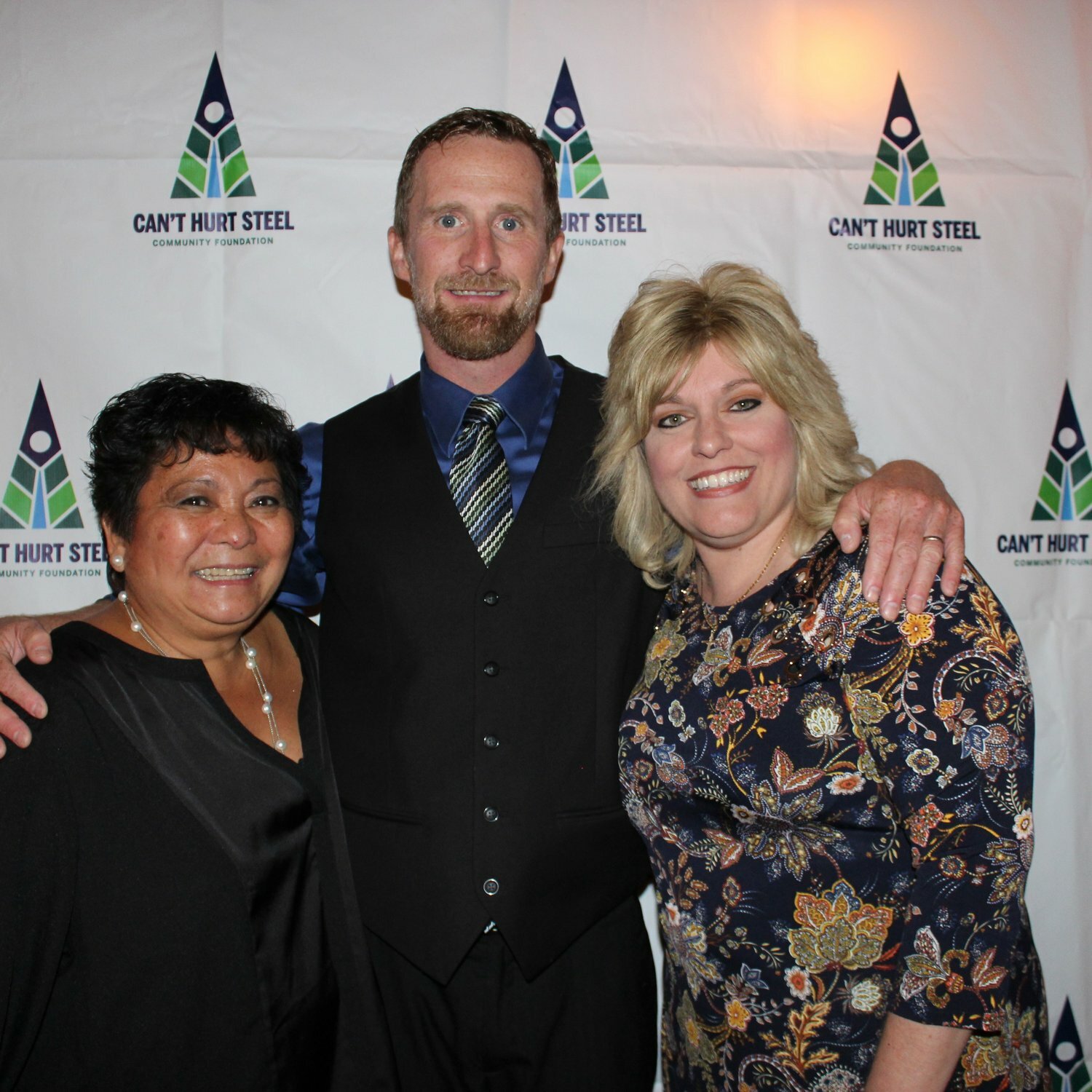 Honored at a Can’t Hurt Steel Foundation gala in 2019 were Cathy Daboul, left; Ryan Gillespie; and Pam Kocher. The foundation was started in response to a question repeatedly asked by J.J. Hanson as he reached the end stage of his battle with cancer: “How do we help people?”..This story was told by his wife, Kristen Hanson, who spoke of her late husband as a man who loved his community and who never gave up.